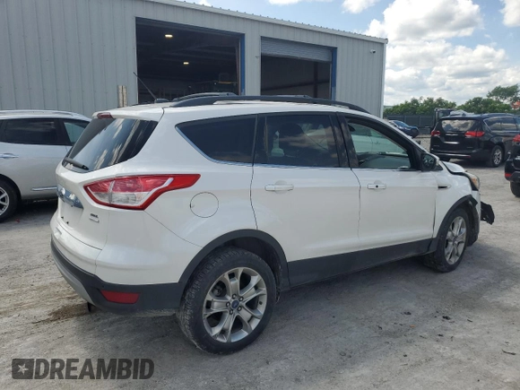 2013 Ford Escape SEL with VIN 1FMCU9H94DUA83824, listed as a Copart auction lot 59198775 with 77,120 mi miles and Salvage title. Bid and sale history available at DreamBid. Image 3.