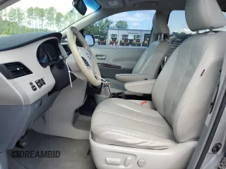 2011 Toyota Sienna XLE AAS with VIN 5TDYK3DC2BS011343, listed as a Copart auction lot 61223675 with 187,206 mi miles and Salvage title. Bid and sale history available at DreamBid. Image 7.