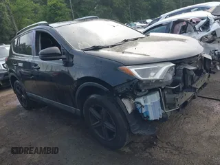 2018 Toyota RAV4 LE with VIN 2T3BFREV4JW713108, listed as a IAAI auction lot 42480002 with 98,894 mi miles and . Bid and sale history available at DreamBid. Image 1.