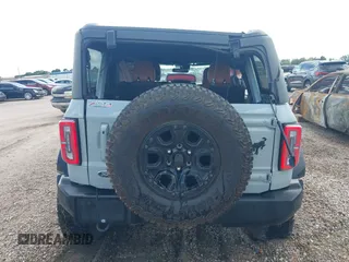 2021 Ford Bronco with VIN 1FMEE5DP6MLA61655, listed as a IAAI auction lot 42492762 with 88,313 mi miles and . Bid and sale history available at DreamBid. Image 16.