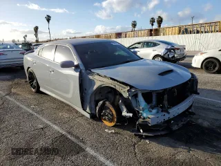 2022 Dodge Charger Scat Pack with VIN 2C3CDXGJ3NH204128, listed as a Copart auction lot 45565495 with 27,130 mi miles and Salvage Title. Bid and sale history available at carsss.com. Image 4.