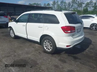 2015 Dodge Journey SXT with VIN 3C4PDCBG0FT653857, listed as a IAAI auction lot 42128410 with 182,960 mi miles and . Bid and sale history available at DreamBid. Image 3.