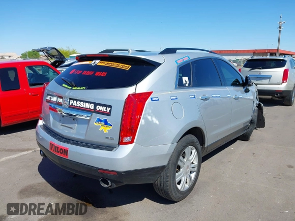 2014 Cadillac SRX with VIN 3GYFNAE31ES576016, listed as a IAAI auction lot 42130992 with 160,114 mi miles and . Bid and sale history available at DreamBid. Image 4.