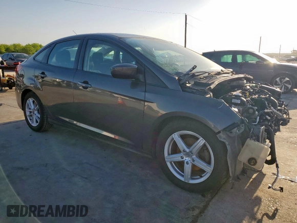 2018 Ford Focus SE z VIN 1FADP3F2XJL256272, wystawiony jako Copart lot #52651675 z przebiegiem 37 897 mil mil oraz Szkody całkowita. Historia ofert i sprzedaży dostępna na DreamBid. Obrazek 4.