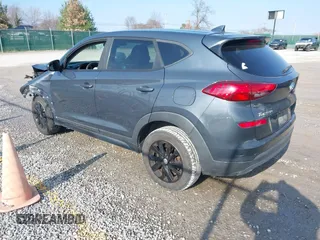 2019 Hyundai Tucson SE with VIN KM8J23A4XKU932814, listed as a IAAI auction lot 40968319 with 107,365 mi miles. Bid and sale history available at carsss.com. Image 3.