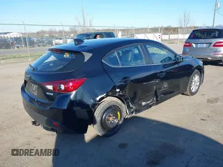2014 Mazda 3 i Grand Touring with VIN JM1BM1M70E1211906, listed as a IAAI auction lot 41878585 with 112,013 mi miles and . Bid and sale history available at DreamBid. Image 4.