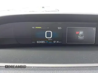 2021 Toyota Prius L Eco z VIN JTDKAMFU3M3152785, wystawiony jako IAAI lot #42501351 z przebiegiem 60 489 mil mil oraz . Historia ofert i sprzedaży dostępna na DreamBid. Obrazek 7.