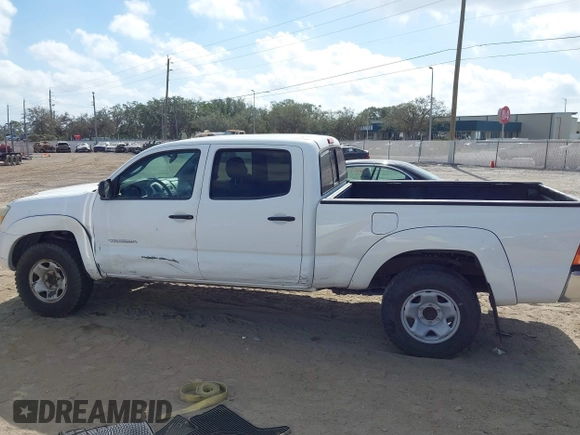 2005 Toyota Tacoma PreRunner with VIN 3TMKU72N65M001821, listed as a IAAI auction lot 41579911 with 301,297 mi miles. Bid and sale history available at carsss.com. Image 13.