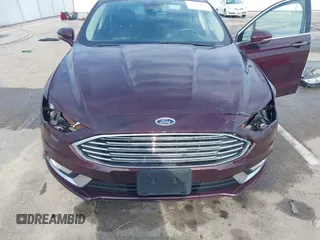 2017 Ford Fusion Titanium z VIN 3FA6P0K94HR271307, wystawiony jako IAAI lot #42595411 z przebiegiem 100 344 mil mil oraz . Historia ofert i sprzedaży dostępna na DreamBid. Obrazek 6.