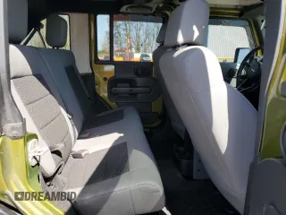2008 Jeep Wrangler Unlimited X with VIN 1J4GA39118L528479, listed as a Copart auction lot 50953825 with 171,156 mi miles and Salvage Title. Bid and sale history available at carsss.com. Image 11.