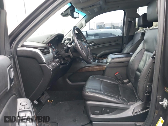 2018 Chevrolet Tahoe LT with VIN 1GNSCBKC5JR126474, listed as a IAAI auction lot 41896310 with 90,928 mi miles and . Bid and sale history available at DreamBid. Image 5.