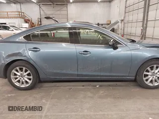 2015 Mazda 6 i Sport with VIN JM1GJ1U65F1170793, listed as a IAAI auction lot 41266146 with 125,701 mi miles and . Bid and sale history available at carsss.com. Image 14.