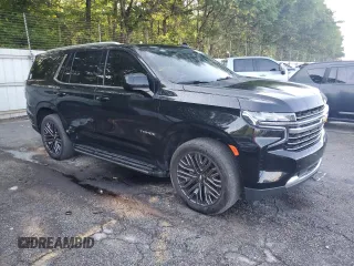 2021 Chevrolet Tahoe LT with VIN 1GNSCNKD8MR120313, listed as a Copart auction lot 56862875 with 125,040 mi miles and Clean title. Bid and sale history available at DreamBid. Image 4.