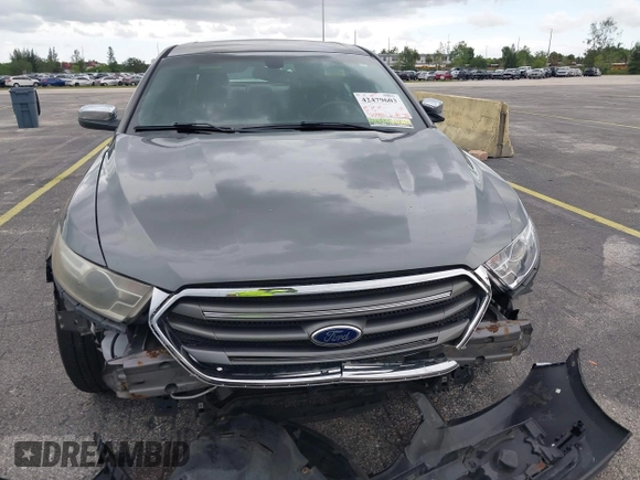 2014 Ford Taurus Limited with VIN 1FAHP2F8XEG115507, listed as a IAAI auction lot 42479603 with 160,986 mi miles and . Bid and sale history available at DreamBid. Image 6.