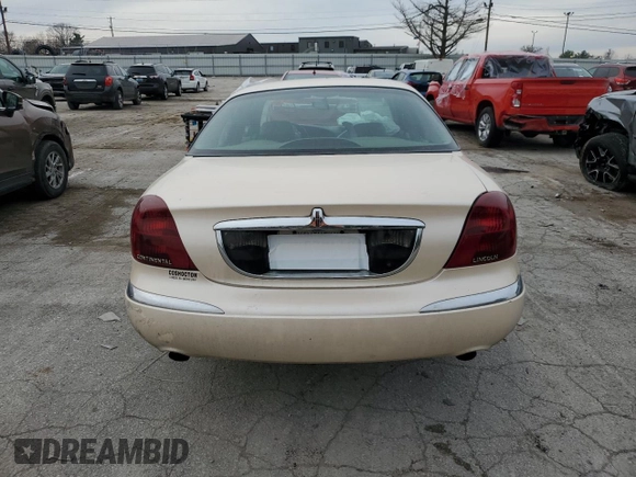 1998 Lincoln Continental with VIN 1LNFM97V5WY720999, listed as a Copart auction lot 84705054 with 0 mi miles and Salvage Title. Bid and sale history available at carsss.com. Image 6.