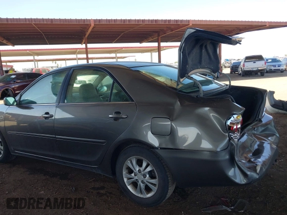 2006 Toyota Camry LE z VIN 4T1BF32K86U635925, wystawiony jako IAAI lot #42267547 z przebiegiem 162 593 mil mil oraz . Historia ofert i sprzedaży dostępna na DreamBid. Obrazek 6.