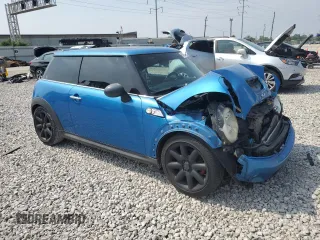 2007 MINI Hardtop S with VIN WMWMF73547TT84449, listed as a Copart auction lot 60490995 with 157,602 mi miles and Salvage title. Bid and sale history available at DreamBid. Image 4.