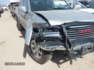 2010 GMC Canyon SLE1 z VIN 1GTJSCDEXA8130361, wystawiony jako IAAI lot #41734671 z przebiegiem 52 621 mil mil oraz . Historia ofert i sprzedaży dostępna na DreamBid. Obrazek 6.