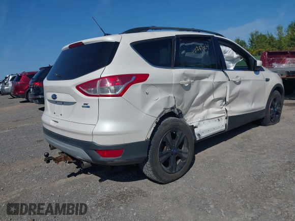 2013 Ford Escape SE with VIN 1FMCU9GXXDUB66562, listed as a IAAI auction lot 40287024 with 120,398 mi miles. Bid and sale history available at carsss.com. Image 4.