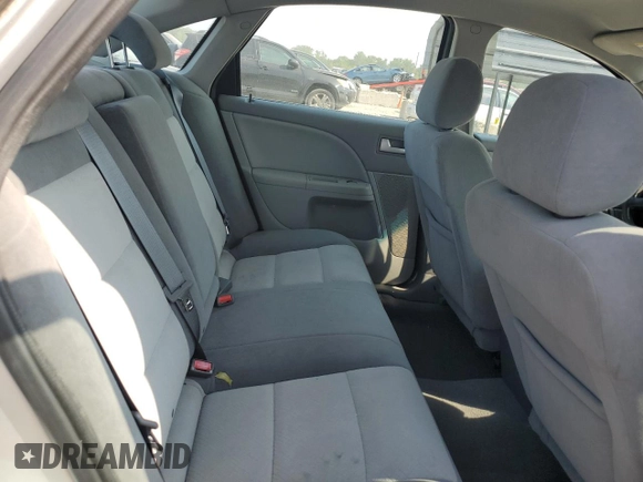 2005 Mercury Montego Luxury z VIN 1MEFM40125G620733, wystawiony jako Copart lot #67879094 z przebiegiem 140 278 mil mil oraz Szkoda całkowita • Salvage title. Historia ofert i sprzedaży dostępna na DreamBid. Obrazek 10.