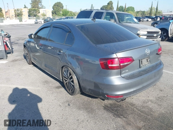 2016 Volkswagen Jetta Sport z VIN 3VWD17AJ0GM386504, wystawiony jako IAAI lot #42000125 z przebiegiem 90 405 mil mil oraz . Historia ofert i sprzedaży dostępna na DreamBid. Obrazek 3.