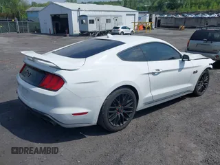 2021 Ford Mustang GT with VIN 1FA6P8CF6M5137253, listed as a IAAI auction lot 42224111 with 51,168 mi miles and . Bid and sale history available at DreamBid. Image 4.