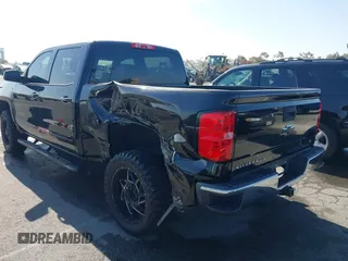 2017 Chevrolet Silverado 1500 LT with VIN 3GCPCREC5HG471758, listed as a IAAI auction lot 41991708 with 77,056 mi miles. Bid and sale history available at carsss.com. Image 3.