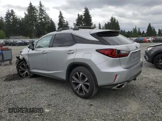 2016 Lexus RX 350 with VIN JTJBZMCA5G2005796, listed as a Copart auction lot 64453905 with 69,784 mi miles and Salvage title. Bid and sale history available at DreamBid. Image 2.