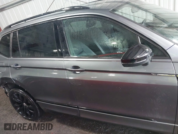 2021 Volkswagen Tiguan SE with VIN 3VV2B7AX0MM039117, listed as a IAAI auction lot 41991481 with 36,824 mi miles and . Bid and sale history available at DreamBid. Image 14.