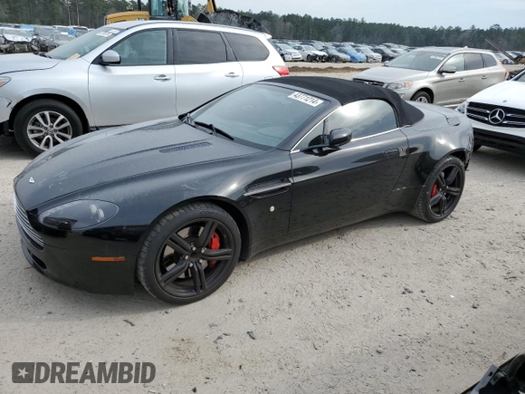 2009 Aston Martin Vantage z VIN SCFBF04CX9GD11942, wystawiony jako Copart lot #43771214 z przebiegiem 52 730 mil mil oraz . Historia ofert i sprzedaży dostępna na DreamBid. Obrazek 1.