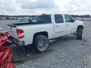 2010 Chevrolet Silverado 1500 LT with VIN 3GCRCSE0XAG129542, listed as a IAAI auction lot 32944734 with 143,810 mi miles and . Bid and sale history available at DreamBid. Image 4.