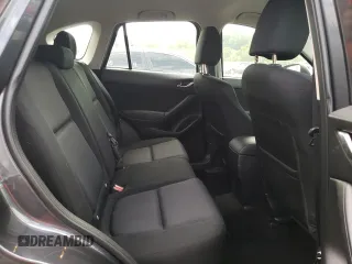 2014 Mazda CX-5 Sport with VIN JM3KE2BE9E0372370, listed as a Copart auction lot 58980165 with 175,477 mi miles and Salvage title. Bid and sale history available at DreamBid. Image 11.