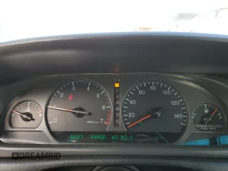 1999 Cadillac Eldorado Touring z VIN 1G6ET1298XU602343, wystawiony jako Copart lot #44327195 z przebiegiem 52 327 mil mil oraz Szkody całkowita. Historia ofert i sprzedaży dostępna na DreamBid. Obrazek 9.