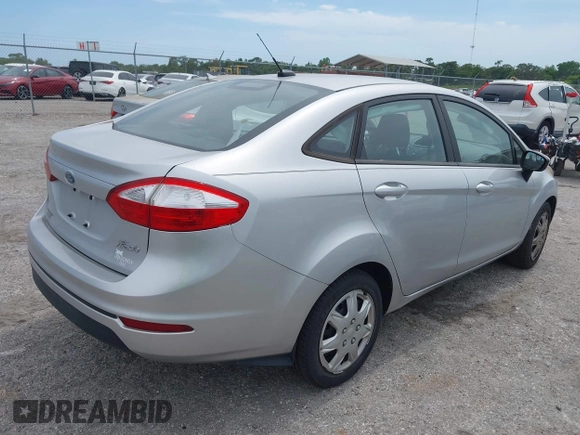 2017 Ford Fiesta S with VIN 3FADP4AJ0HM171227, listed as a IAAI auction lot 42380556 with 88,558 mi miles and . Bid and sale history available at DreamBid. Image 4.