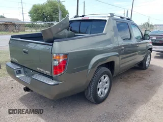 2007 Honda Ridgeline RTL with VIN 2HJYK16577H537990, listed as a IAAI auction lot 42454619 with 182,911 mi miles and . Bid and sale history available at DreamBid. Image 4.