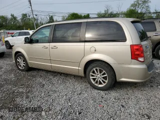 2014 Dodge Grand Caravan SXT z VIN 2C4RDGCG1ER214411, wystawiony jako Copart lot #55497065 z przebiegiem 176 662 mil mil oraz Czysty tytuł • Clean title. Historia ofert i sprzedaży dostępna na DreamBid. Obrazek 2.