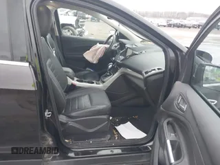2013 Ford Escape SEL with VIN 1FMCU9H95DUC64995, listed as a IAAI auction lot 40821020 with 120,114 mi miles. Bid and sale history available at carsss.com. Image 5.
