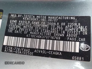 2007 Toyota Camry CE z VIN 4T1BE46K37U716769, wystawiony jako IAAI lot #42233779 z przebiegiem 166 265 mil mil oraz . Historia ofert i sprzedaży dostępna na DreamBid. Obrazek 9.