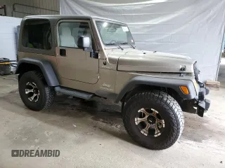 2005 Jeep Wrangler Sport z VIN 1J4FA49S75P325028, wystawiony jako Copart lot #56942315 z przebiegiem 169 988 mil mil oraz Szkoda całkowita • Salvage title. Historia ofert i sprzedaży dostępna na DreamBid. Obrazek 4.