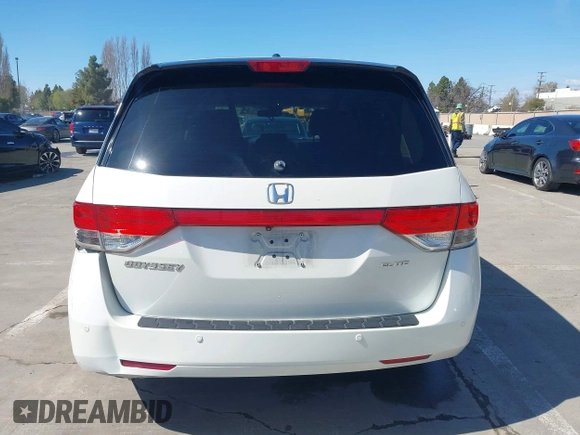 2015 Honda Odyssey Touring Elite with VIN 5FNRL5H91FB038099, listed as a IAAI auction lot 41829649 with 167,017 mi miles and . Bid and sale history available at DreamBid. Image 16.