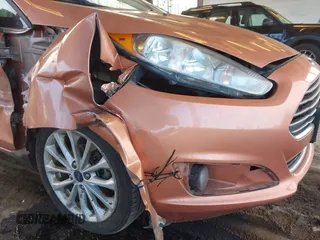 2017 Ford Fiesta Titanium with VIN 3FADP4FJ6HM139455, listed as a IAAI auction lot 41533050 with 104,788 mi miles and . Bid and sale history available at DreamBid. Image 6.