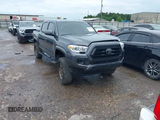 2023 Toyota Tacoma SR z VIN 3TYCZ5AN5PT144908, wystawiony jako IAAI lot #42495056 z przebiegiem 21 894 mil mil oraz . Historia ofert i sprzedaży dostępna na DreamBid. Obrazek 1.