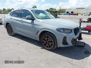 2023 BMW X4 xDrive30i with VIN 5UX33DT04P9P72450, listed as a IAAI auction lot 42527668 with 26,495 mi miles and . Bid and sale history available at DreamBid. Image 1.