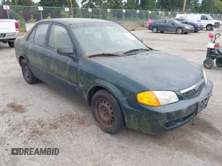 1999 Mazda Protege DX z VIN JM1BJ2222X0151674, wystawiony jako IAAI lot #42444584 z przebiegiem 219 862 mil mil oraz . Historia ofert i sprzedaży dostępna na DreamBid. Obrazek 1.