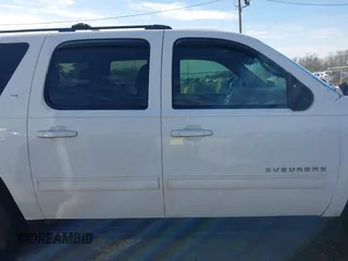 2011 Chevrolet Suburban LT with VIN 1GNSCJE00BR218380, listed as a IAAI auction lot 41628402 with 133,394 mi miles. Bid and sale history available at carsss.com. Image 14.