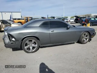 2012 Dodge Challenger R/T z VIN 2C3CDYBT2CH268592, wystawiony jako Copart lot #53143395 z przebiegiem 101 390 mil mil oraz Szkoda całkowita • Salvage title. Historia ofert i sprzedaży dostępna na DreamBid. Obrazek 3.