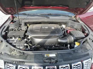 2017 Jeep Grand Cherokee Overland z VIN 1C4RJFCG5HC615878, wystawiony jako Copart lot #52087675 z przebiegiem 90 353 mil mil oraz Szkody całkowita. Historia ofert i sprzedaży dostępna na DreamBid. Obrazek 12.