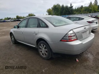 2009 Ford Taurus SEL with VIN 1FAHP24W79G110613, listed as a Copart auction lot 72397834 with 212,234 mi miles and Salvage Title. Bid and sale history available at carsss.com. Image 2.