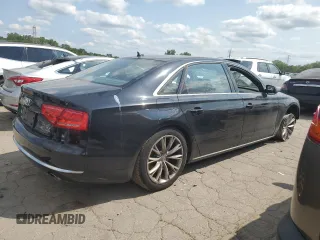 2011 Audi A8 z VIN WAURVAFD9BN005595, wystawiony jako Copart lot #66302644 z przebiegiem 106 610 mil mil oraz Nie do naprawy. Historia ofert i sprzedaży dostępna na DreamBid. Obrazek 3.