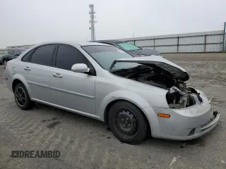 2006 Suzuki Forenza z VIN KL5JD56Z76K411376, wystawiony jako Copart lot #82751694 z przebiegiem Nie podano mil oraz Szkody całkowita. Historia ofert i sprzedaży dostępna na DreamBid. Obrazek 4.